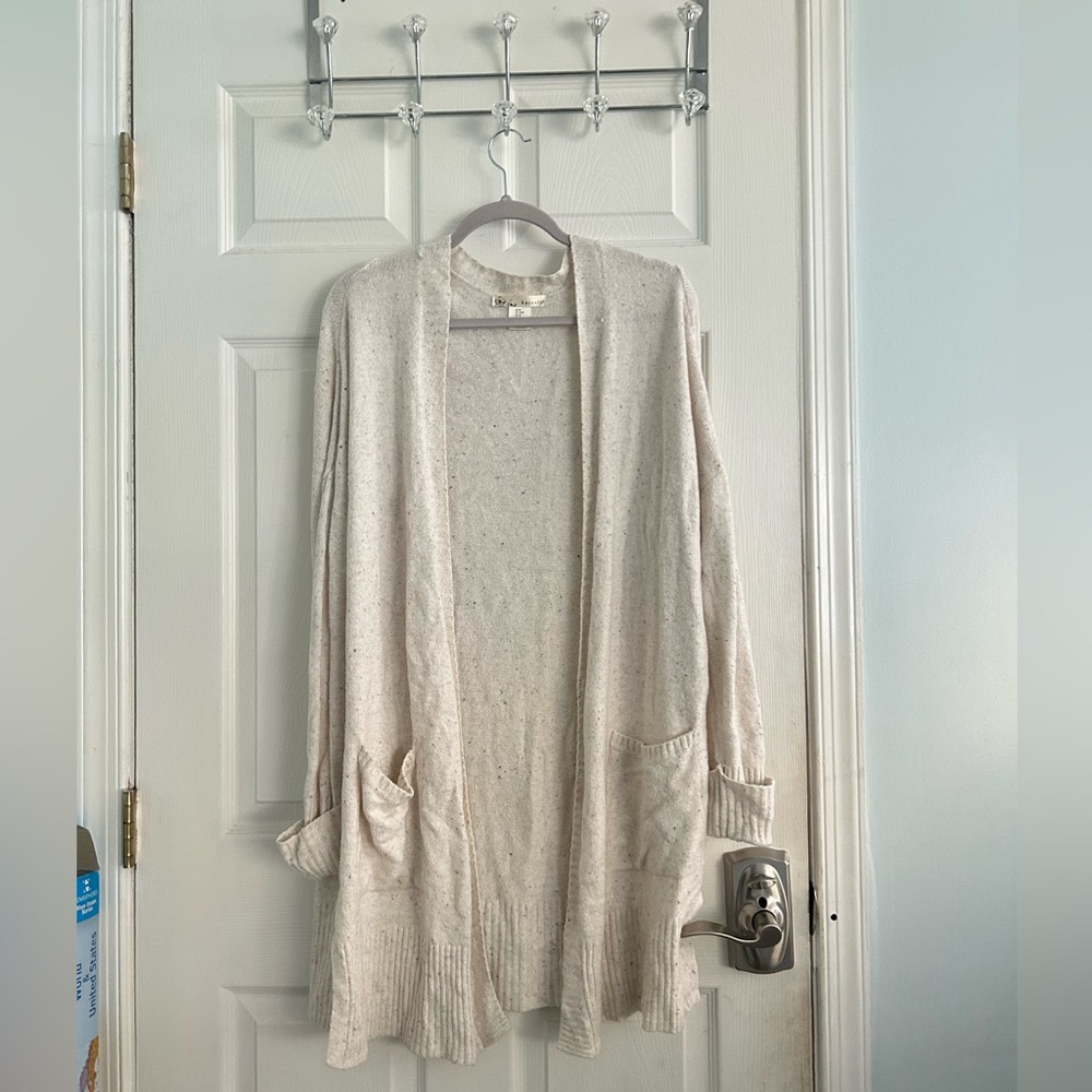 Kaisely Woman’s white/black spotted cardigan size M